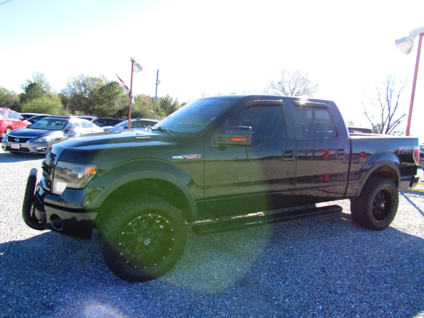 2013 Black /Black Ford F-150 XLT SuperCrew 6.5-ft. Bed 4WD (1FTFW1EF9DK) with an 5.0L V8 engine, Automatic transmission, located at 15016 S Hwy 231, Midland City, AL, 36350, (334) 983-3001, 31.306210, -85.495277 - Photo#2